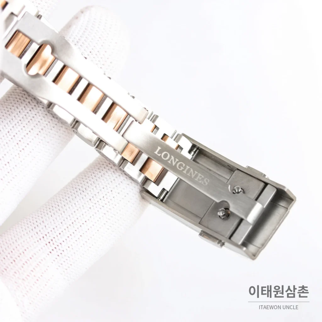 론진 콘퀘스트 헤리티지 스틸 쓰리핸즈 오토매틱 40mm 브라운 다이얼 로즈골드 브레이슬릿