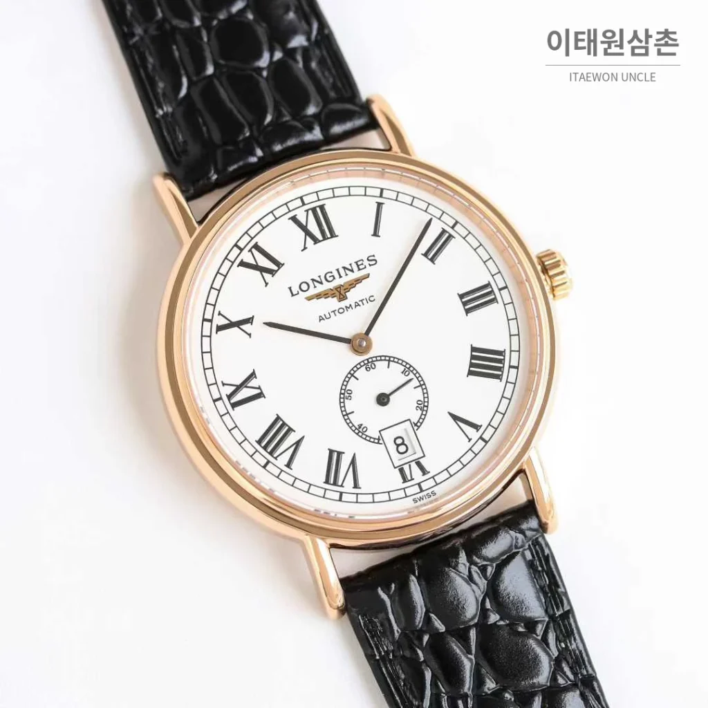 론진 엘레강스 스틸 화이트다이얼 로만인덱스 스몰세컨즈 오토매틱 38.5mm 블랙 가죽 스트랩 로즈골드 베젤