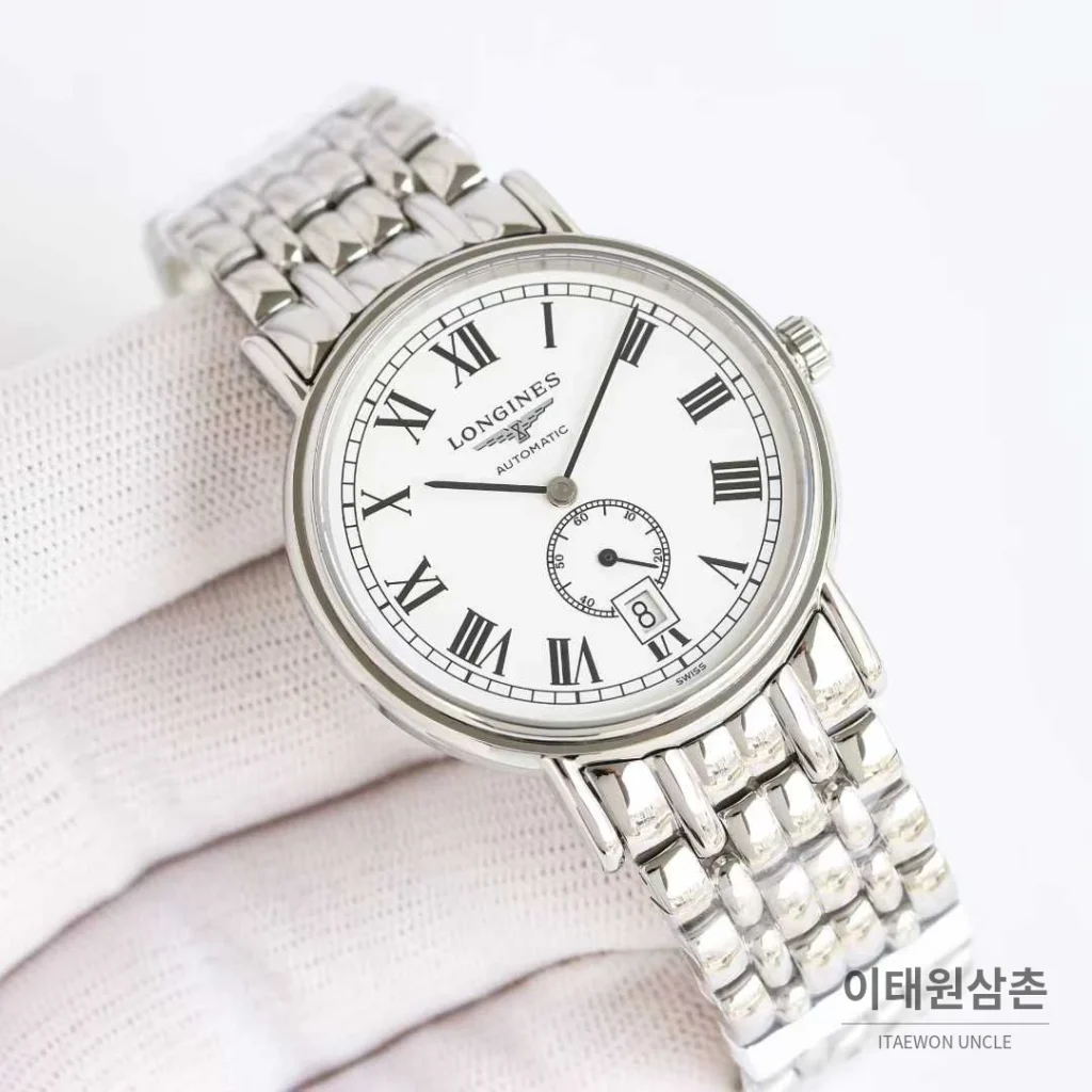론진 엘레강스 스틸 화이트다이얼 로만인덱스 스몰세컨즈 오토매틱 38.5mm 스틸 브레이슬릿
