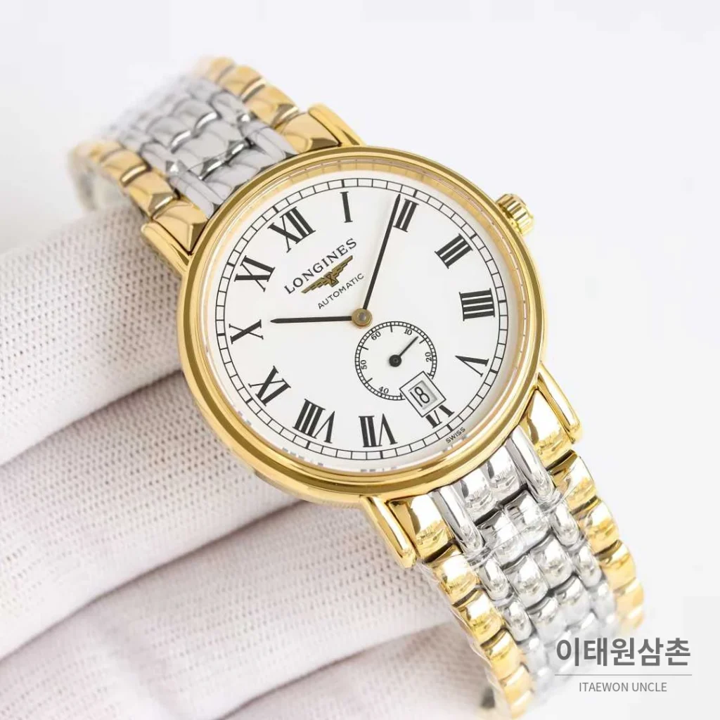 론진 엘레강스 스틸 화이트다이얼 로만인덱스 스몰세컨즈 오토매틱 38.5mm 투톤 브레이슬릿 골드 베젤