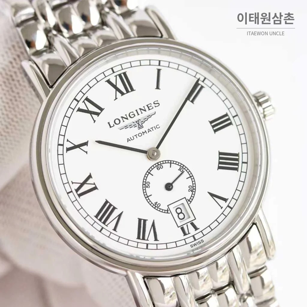 론진 엘레강스 스틸 화이트다이얼 로만인덱스 스몰세컨즈 오토매틱 38.5mm 스틸 브레이슬릿
