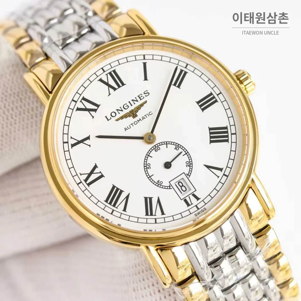 론진 엘레강스 스틸 화이트다이얼 로만인덱스 스몰세컨즈 오토매틱 38.5mm 투톤 브레이슬릿 골드 베젤