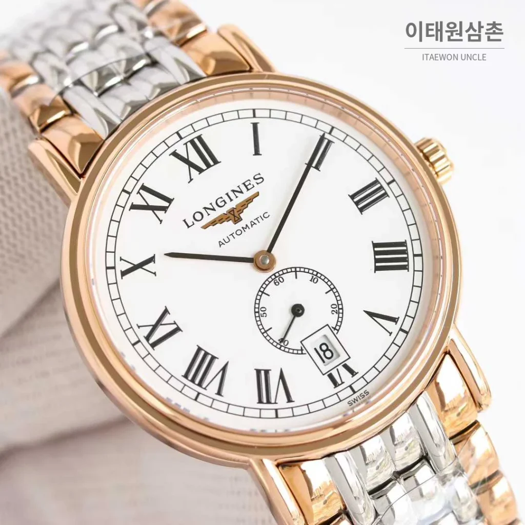 론진 엘레강스 스틸 화이트다이얼 로만인덱스 스몰세컨즈 오토매틱 38.5mm 투톤 브레이슬릿 로즈골드 베젤