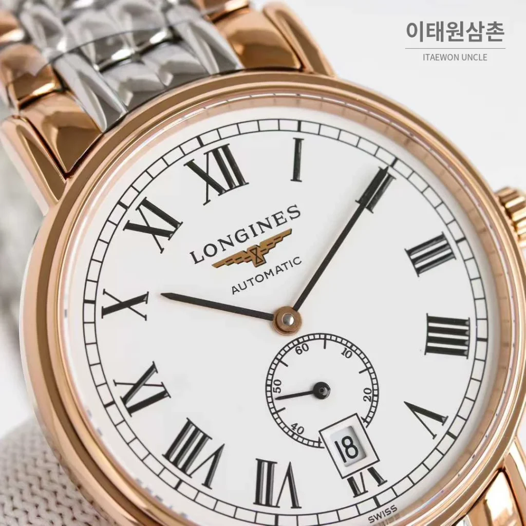 론진 엘레강스 스틸 화이트다이얼 로만인덱스 스몰세컨즈 오토매틱 38.5mm 투톤 브레이슬릿 로즈골드 베젤