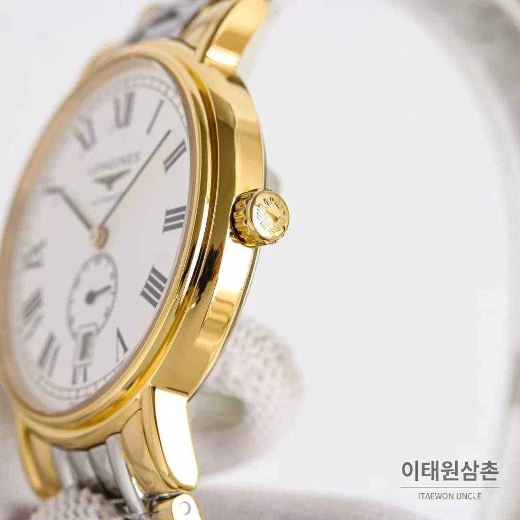 론진 엘레강스 스틸 화이트다이얼 로만인덱스 스몰세컨즈 오토매틱 38.5mm 투톤 브레이슬릿 골드 베젤