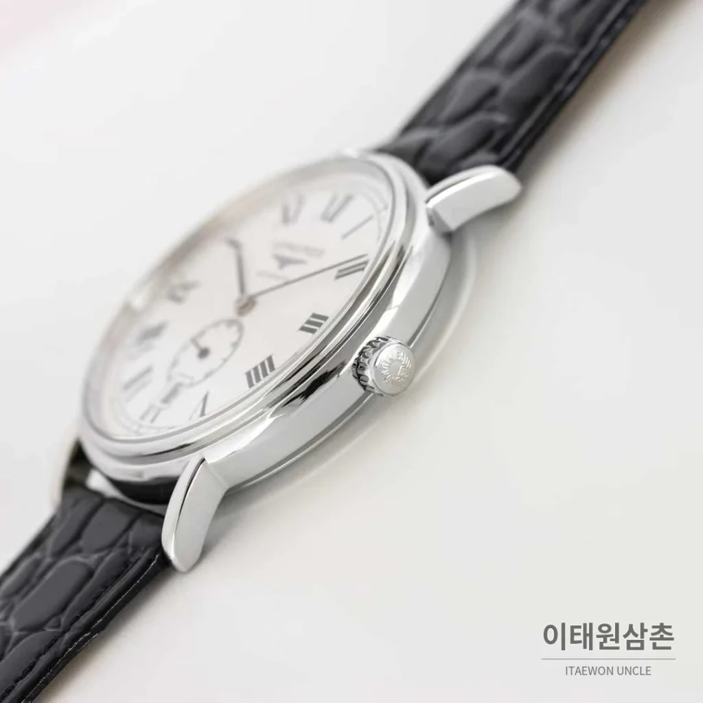론진 엘레강스 스틸 화이트다이얼 로만인덱스 스몰세컨즈 오토매틱 38.5mm 블랙 가죽 스트랩
