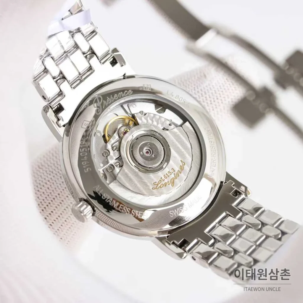 론진 엘레강스 스틸 화이트다이얼 로만인덱스 스몰세컨즈 오토매틱 38.5mm 스틸 브레이슬릿
