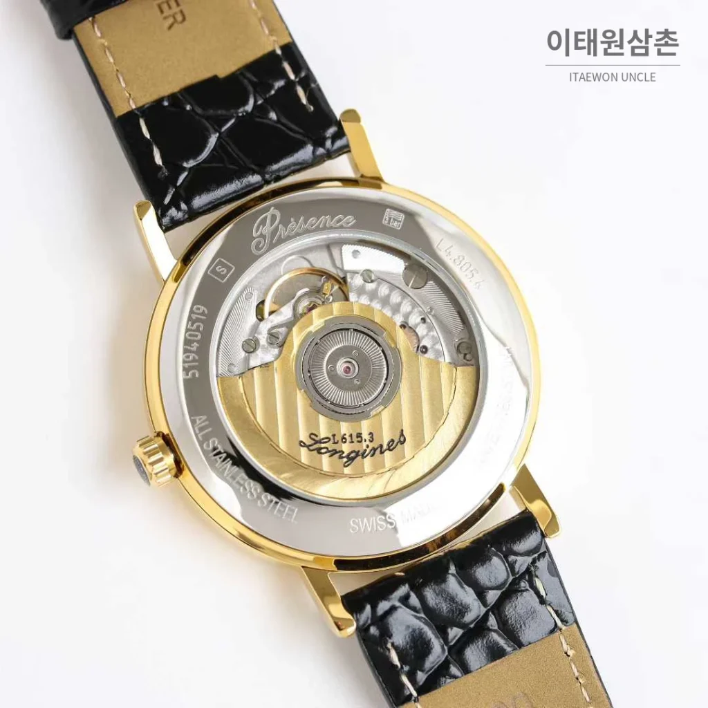 론진 엘레강스 스틸 화이트다이얼 로만인덱스 스몰세컨즈 오토매틱 38.5mm 블랙 가죽 스트랩 골드 베젤