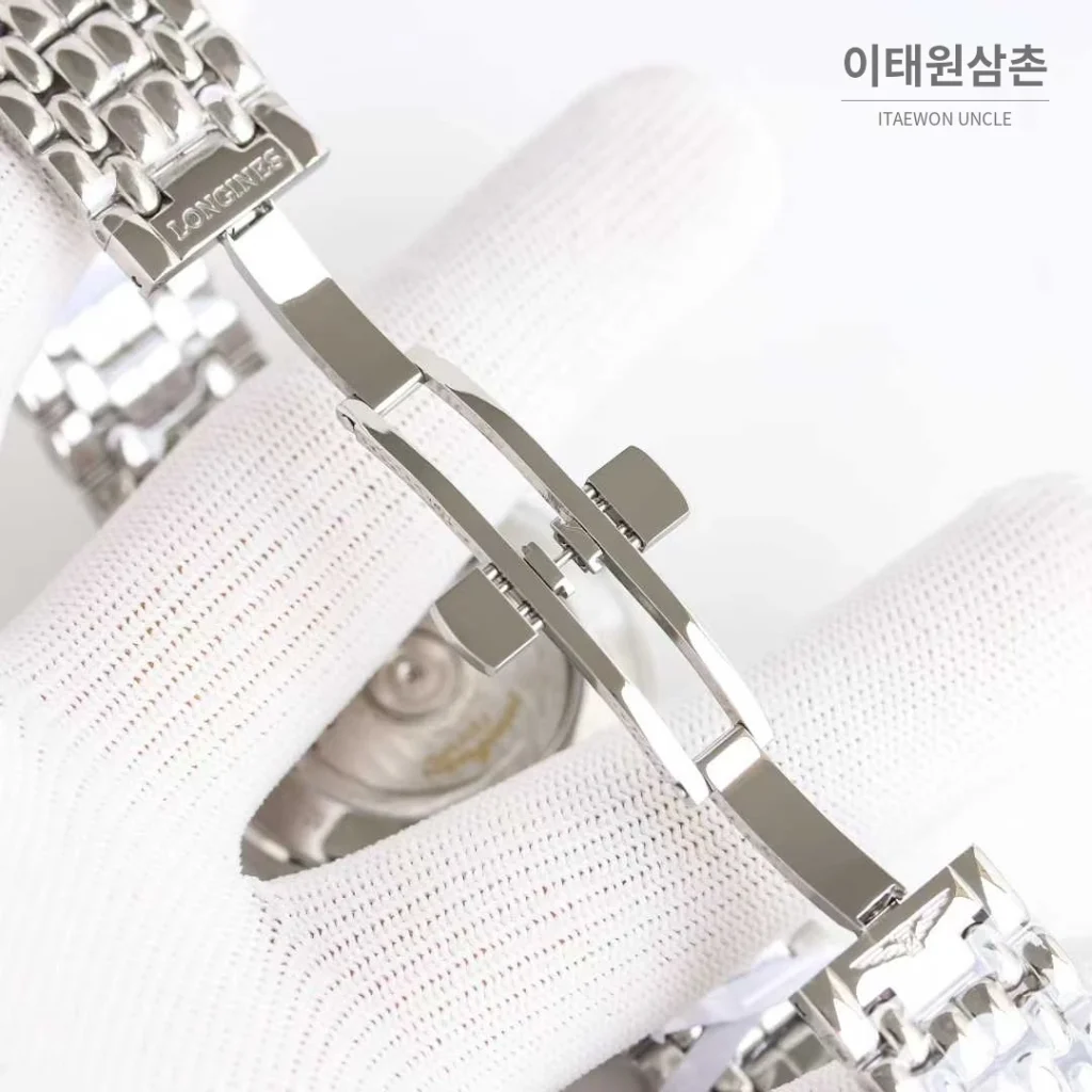 론진 엘레강스 스틸 화이트다이얼 로만인덱스 스몰세컨즈 오토매틱 38.5mm 스틸 브레이슬릿
