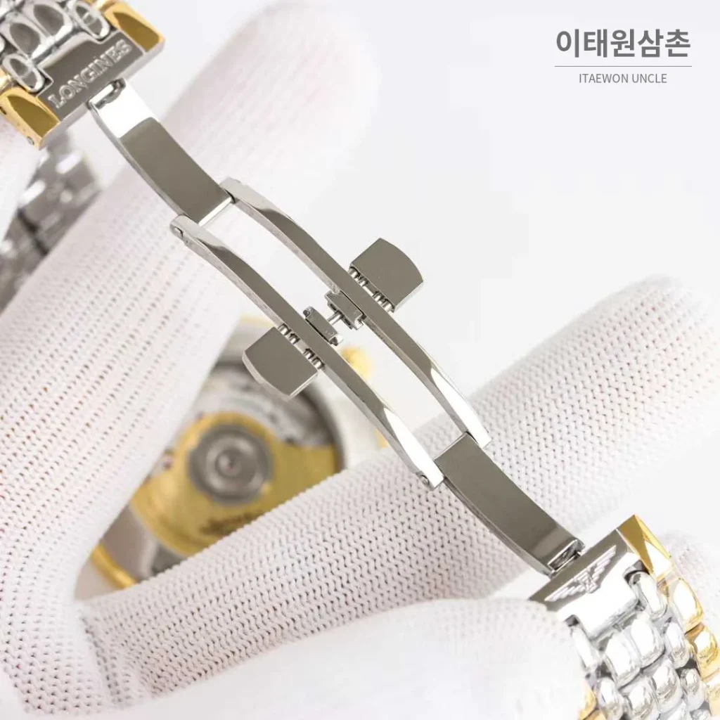 론진 엘레강스 스틸 화이트다이얼 로만인덱스 스몰세컨즈 오토매틱 38.5mm 투톤 브레이슬릿 골드 베젤