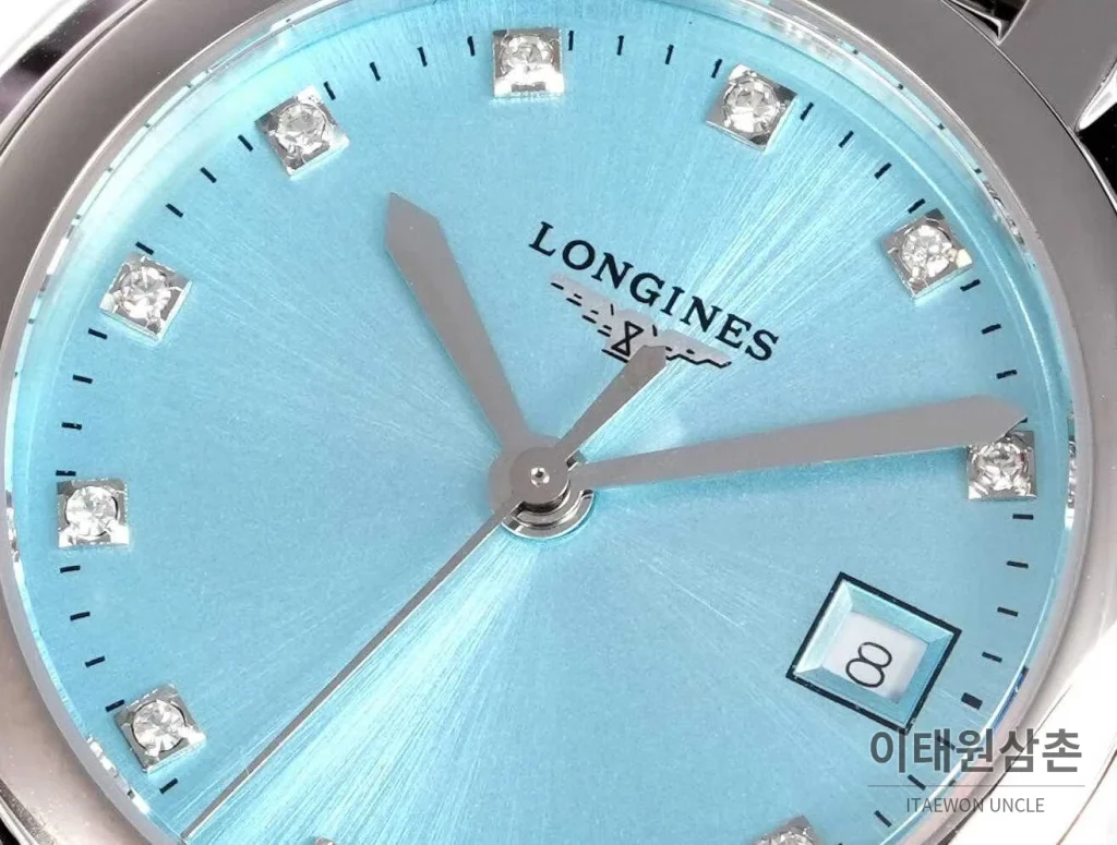 론진 프리마루나 스틸 화이트자개 로만인덱스 블루핸즈 쿼츠 30mm 아이스블루 다이얼