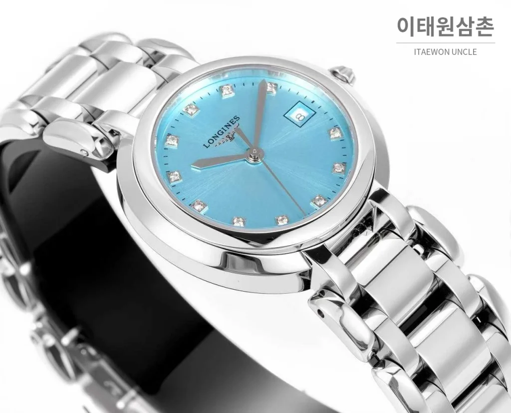 론진 프리마루나 스틸 화이트자개 로만인덱스 블루핸즈 쿼츠 30mm 아이스블루 다이얼