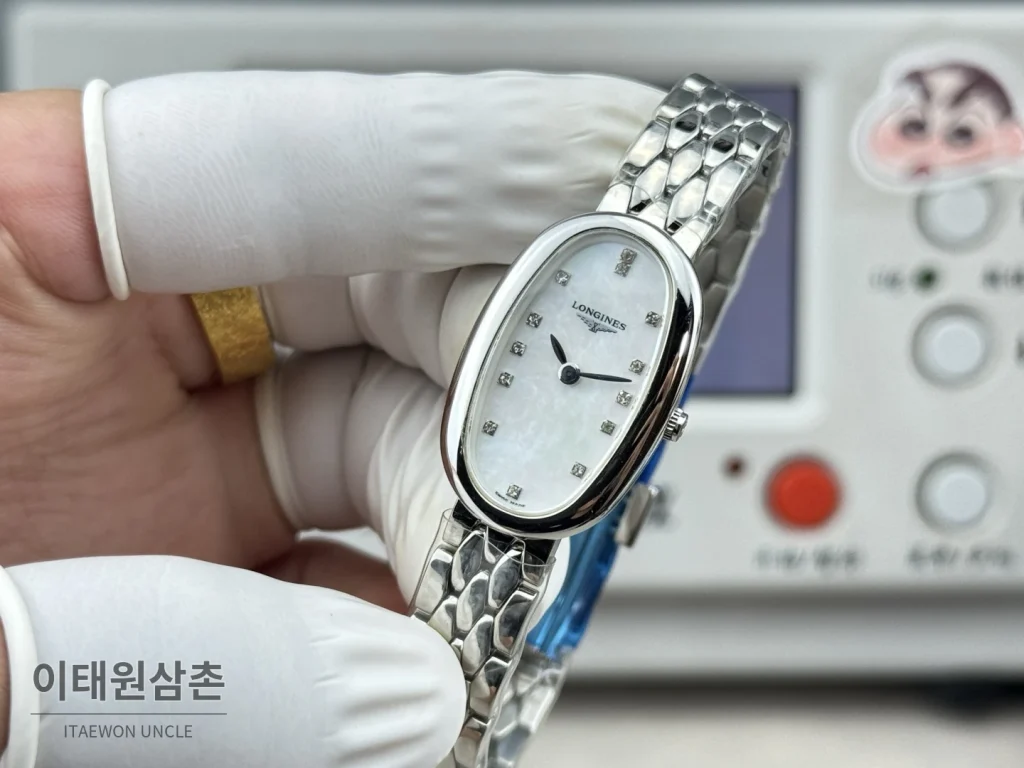 론진 심포네트 미니 스테인리스 타원 케이스 화이트다이얼 쿼츠 25mm 화이트 / 실버