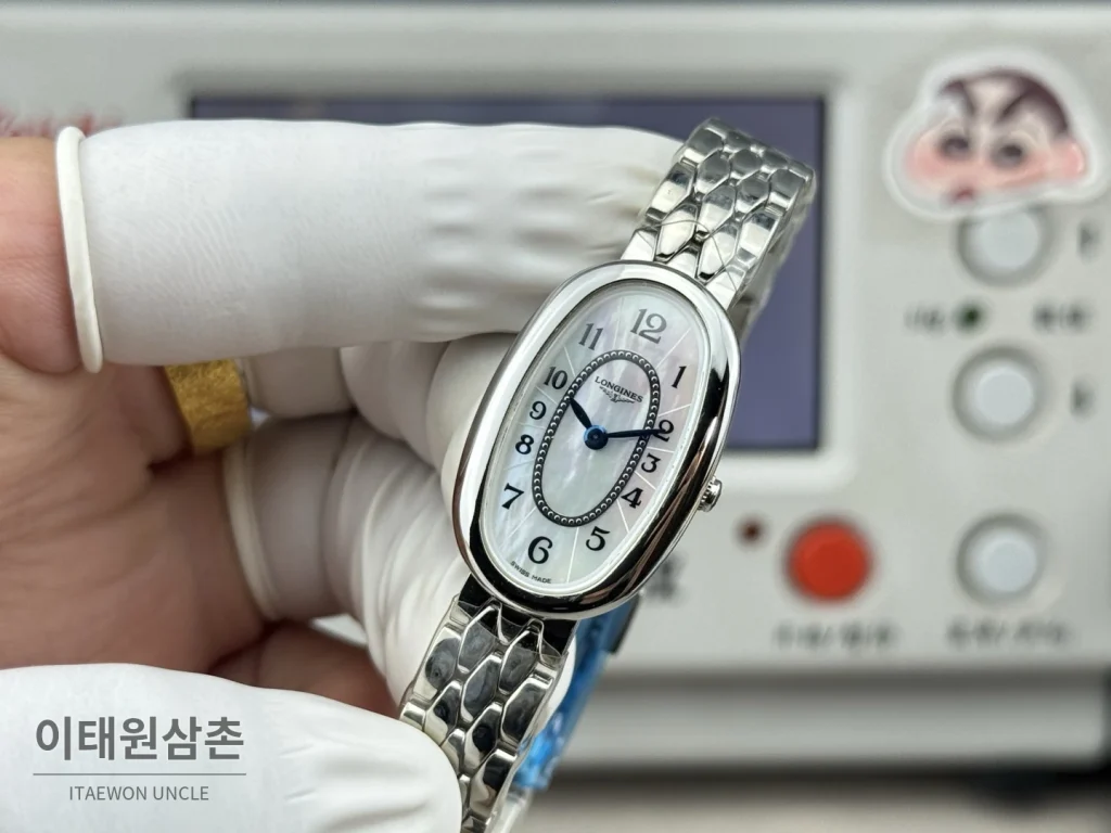 론진 심포네트 미니 스테인리스 타원 케이스 화이트다이얼 쿼츠 25mm 화이트 / 실버 (3)