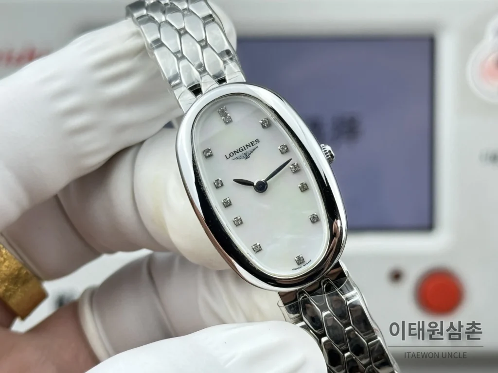 론진 심포네트 미니 스테인리스 타원 케이스 화이트다이얼 쿼츠 25mm 화이트 / 실버