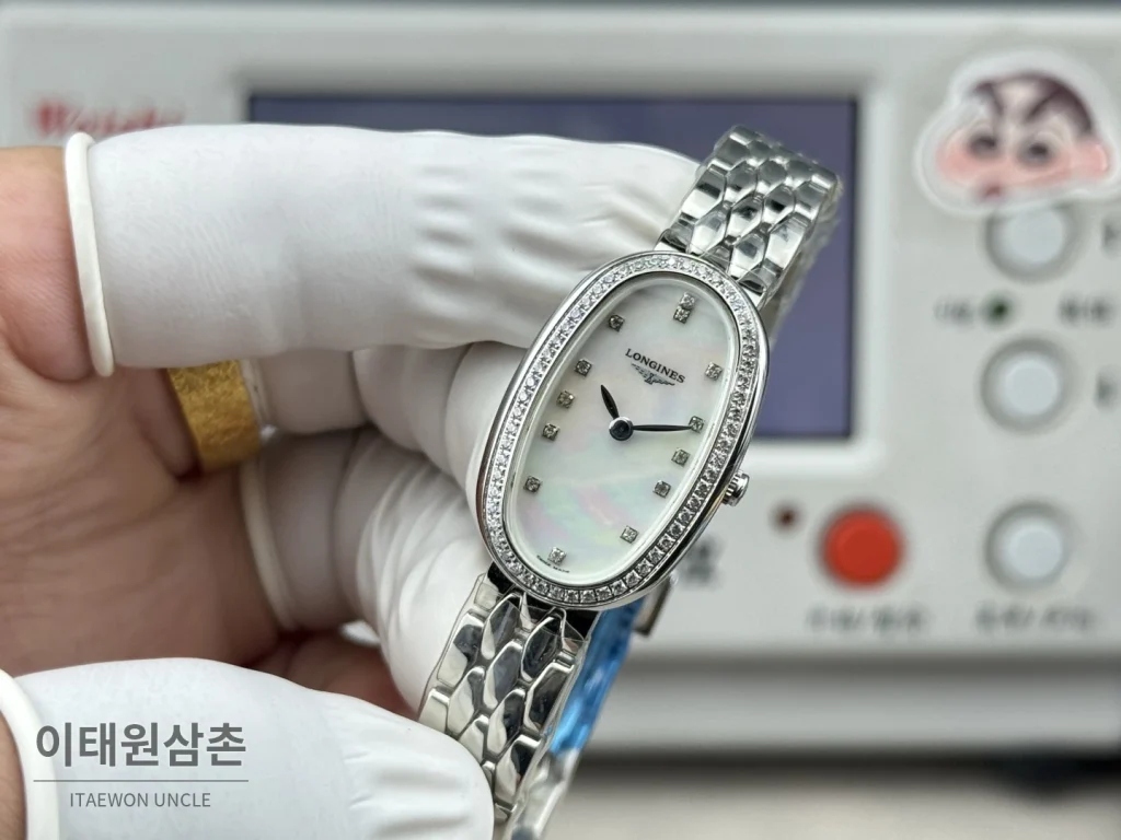 론진 심포네트 미니 스테인리스 타원형 화이트다이얼 쿼츠 25mm 화이트 / 실버