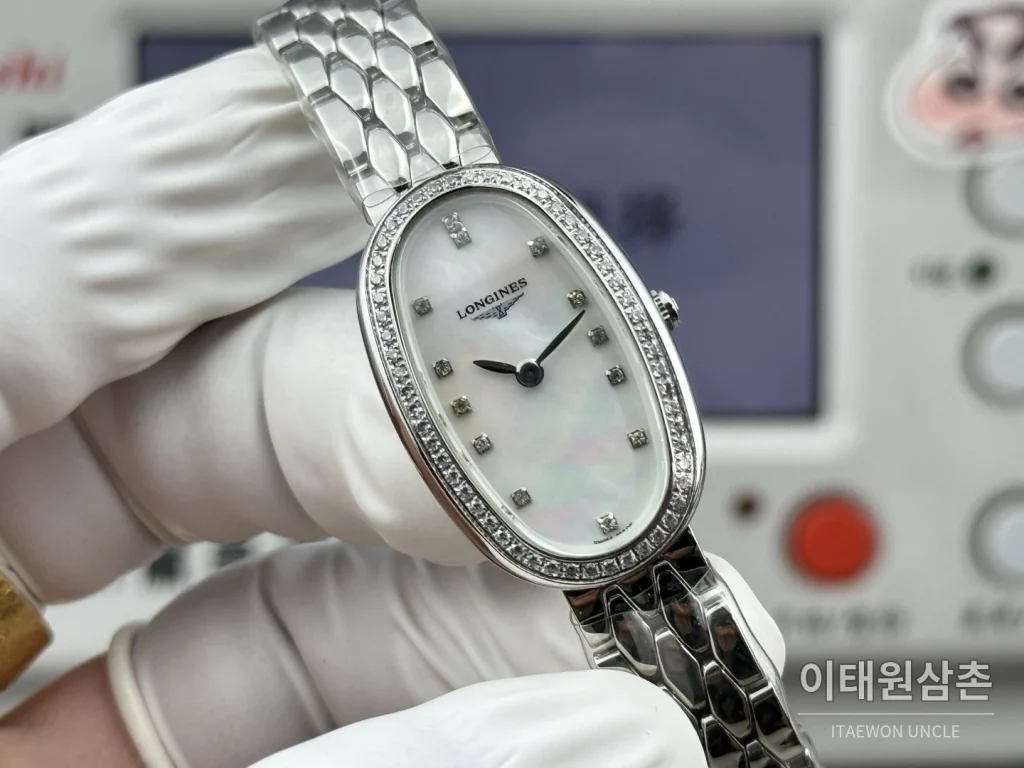 론진 심포네트 미니 스테인리스 타원형 화이트다이얼 쿼츠 25mm 화이트 / 실버