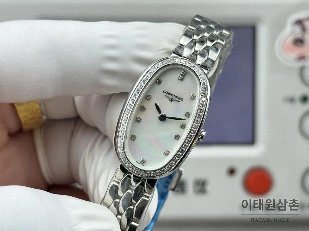 론진 심포네트 미니 스테인리스 타원형 화이트다이얼 쿼츠 25mm 화이트 / 실버