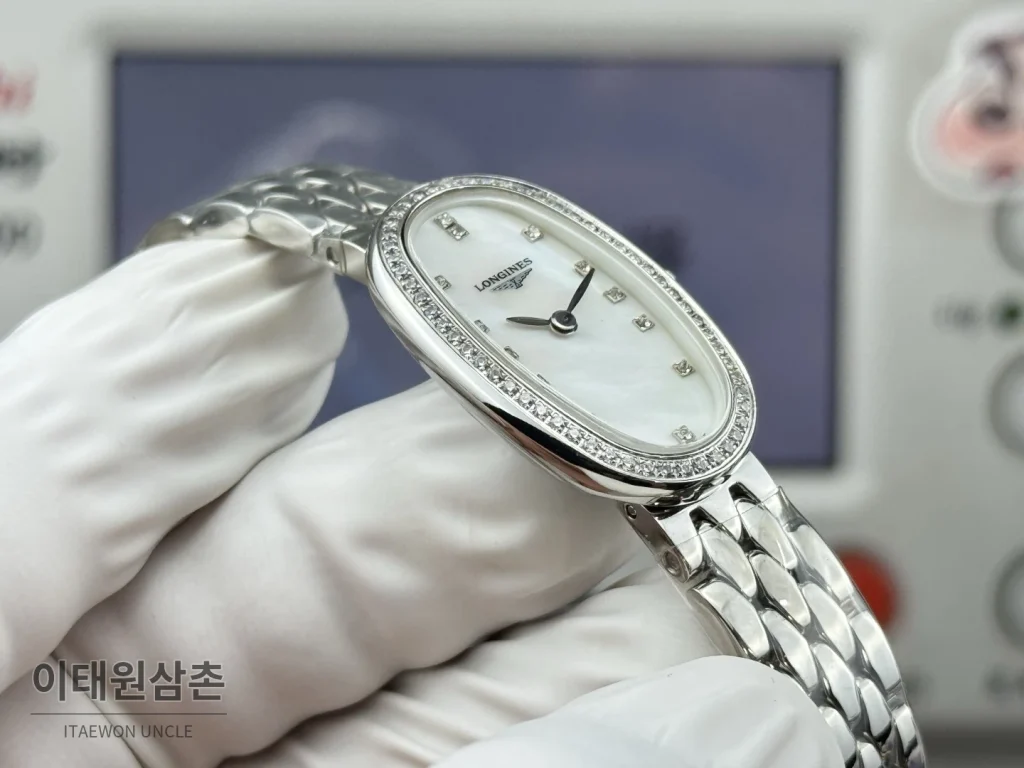 론진 심포네트 미니 스테인리스 타원형 화이트다이얼 쿼츠 25mm 화이트 / 실버