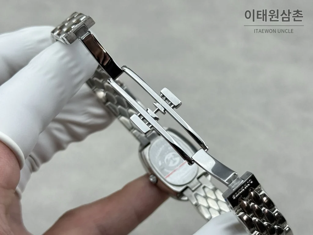론진 심포네트 미니 스테인리스 타원형 화이트다이얼 쿼츠 25mm 화이트 / 실버