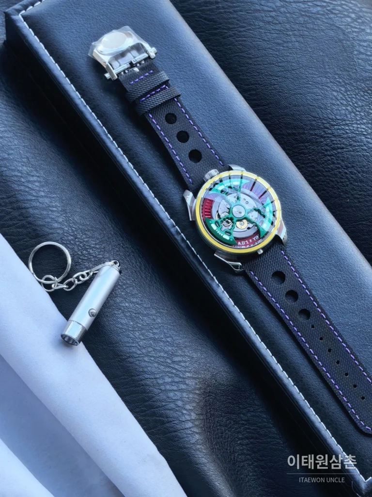엠비앤에프 M.A.D.1S 사이드타임 대형로터 퍼플 오토매틱 42mm 스켈레톤 다이얼 블랙 러버 스트랩 옐로우 베젤