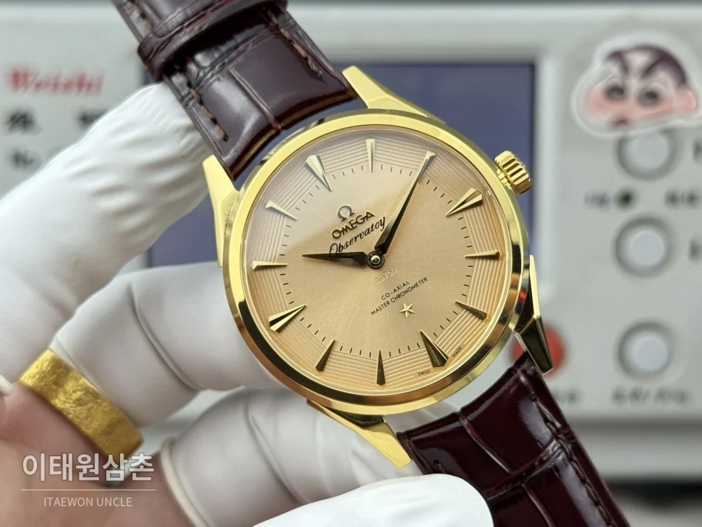 오메가 컨스텔레이션 오토매틱 39.4mm 샴페인 다이얼 버건디 가죽 스트랩 골드 케이스