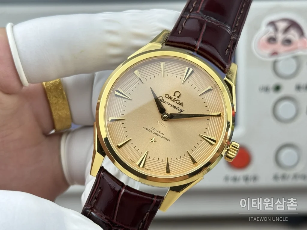 오메가 컨스텔레이션 오토매틱 39.4mm 샴페인 다이얼 버건디 가죽 스트랩 골드 케이스