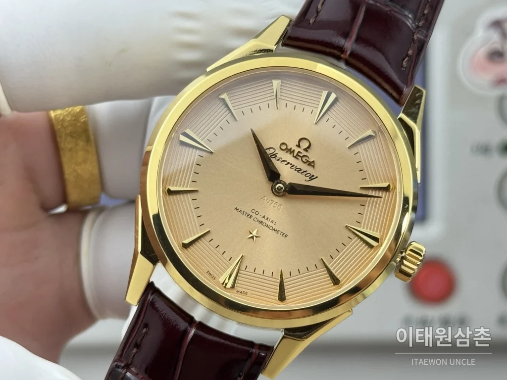 오메가 컨스텔레이션 오토매틱 39.4mm 샴페인 다이얼 버건디 가죽 스트랩 골드 케이스