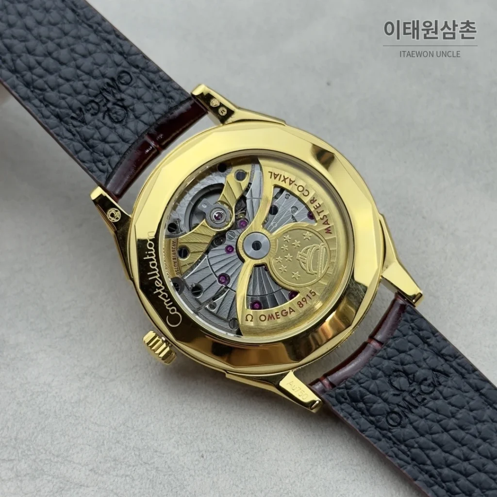 오메가 컨스텔레이션 오토매틱 39.4mm 샴페인 다이얼 버건디 가죽 스트랩 골드 케이스