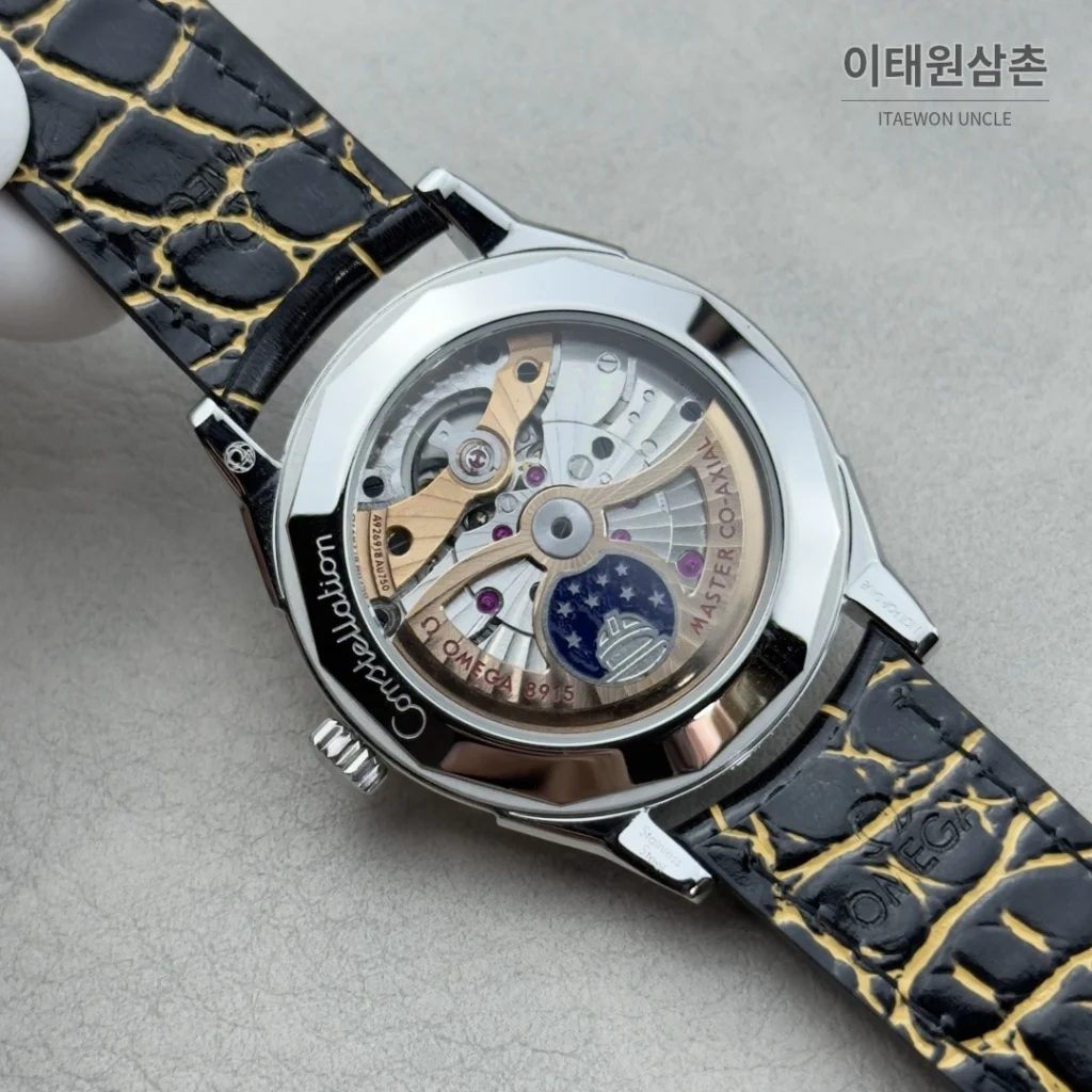 오메가 컨스텔레이션 오토매틱 39.4mm 샴페인 다이얼 블랙 가죽 스트랩