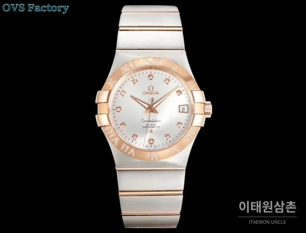 오메가 컨스텔레이션 스틸 골드톤 다이아몬드 로만베젤 데이트 오토매틱 38mm 골드 / 실버 투톤 브레이슬릿