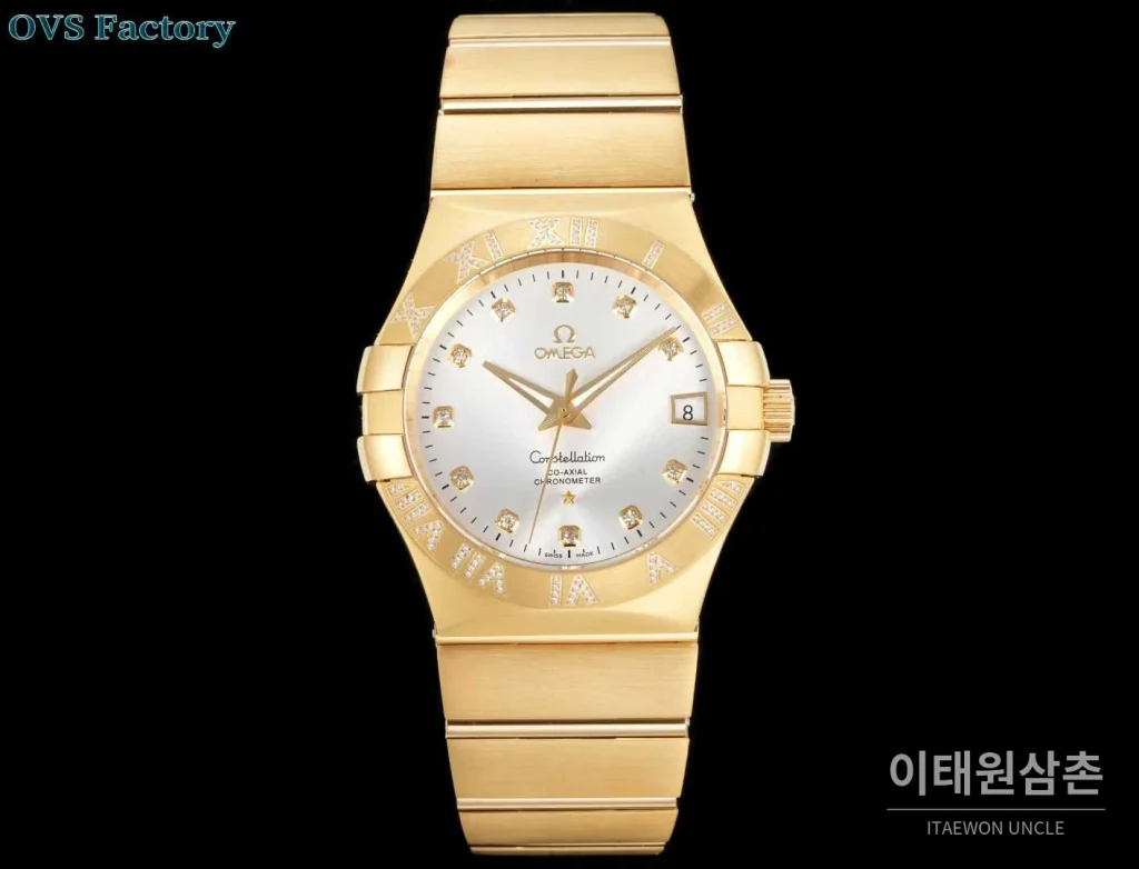 오메가 컨스텔레이션 스틸 골드톤 다이아몬드 로만베젤 데이트 오토매틱 38mm 골드 / 실버 골드 브레이슬릿