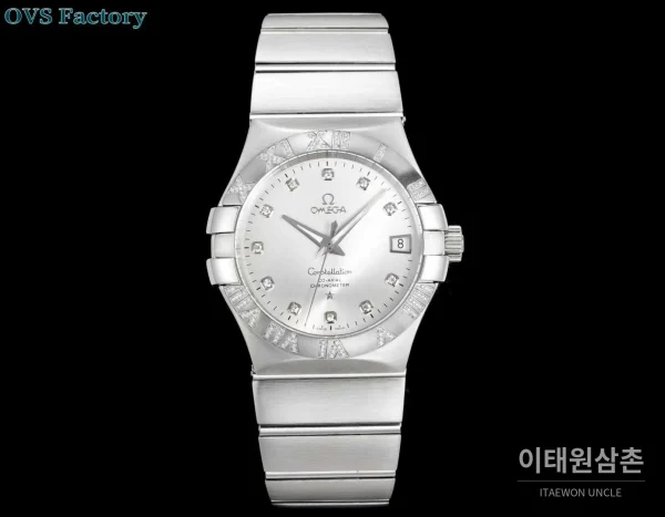 오메가 컨스텔레이션 스틸 골드톤 다이아몬드 로만베젤 데이트 오토매틱 38mm 골드 / 실버 스틸 브레이슬릿