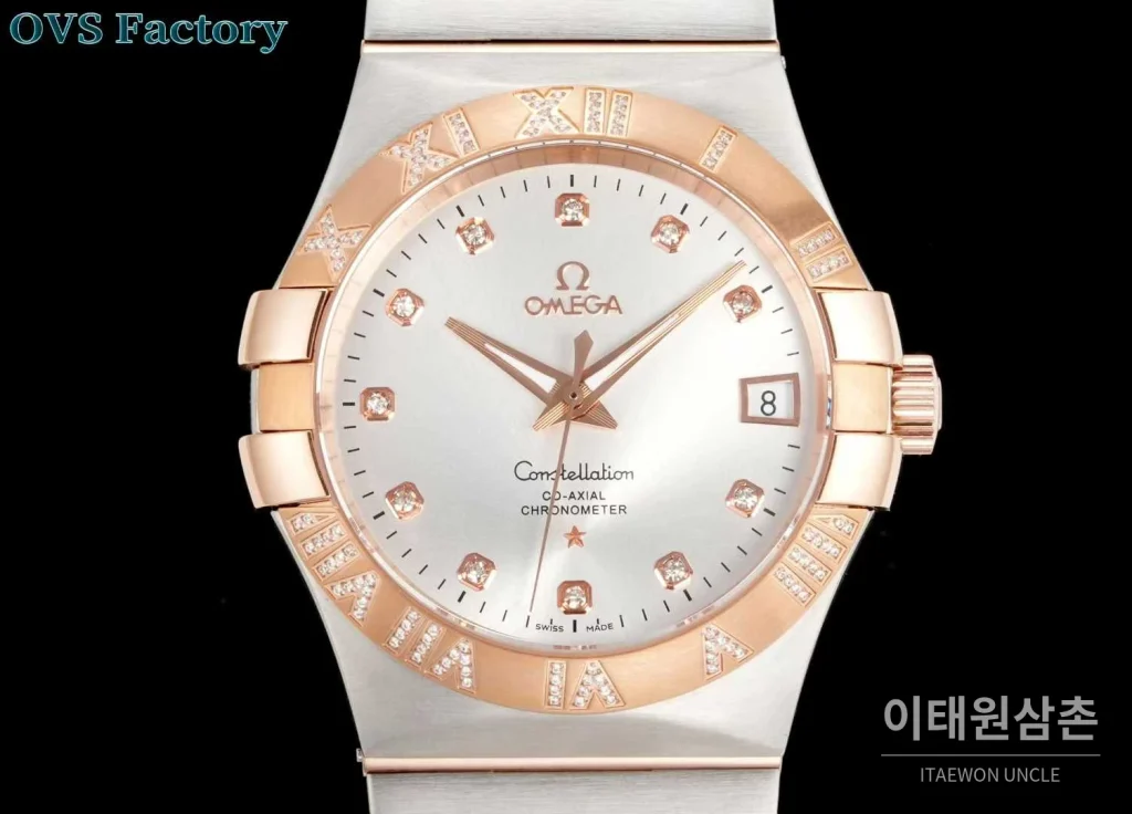 오메가 컨스텔레이션 스틸 골드톤 다이아몬드 로만베젤 데이트 오토매틱 38mm 골드 / 실버 투톤 브레이슬릿