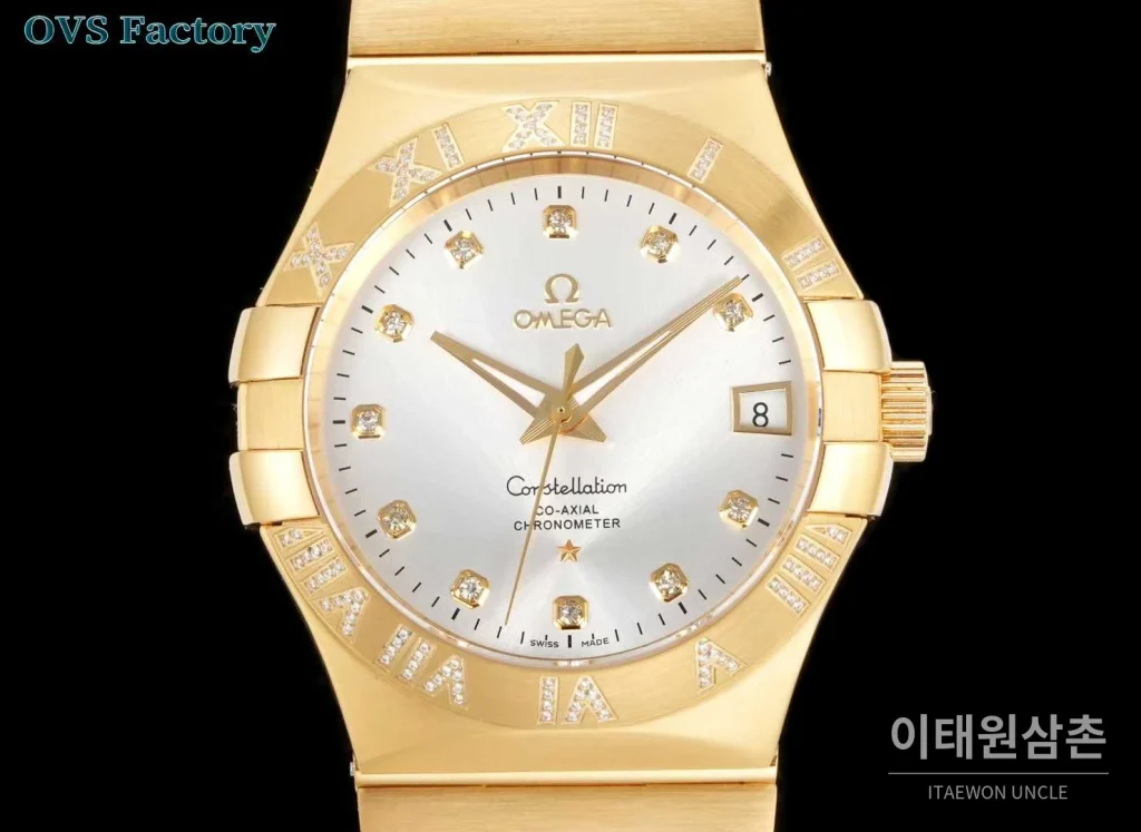 오메가 컨스텔레이션 스틸 골드톤 다이아몬드 로만베젤 데이트 오토매틱 38mm 골드 / 실버 골드 브레이슬릿