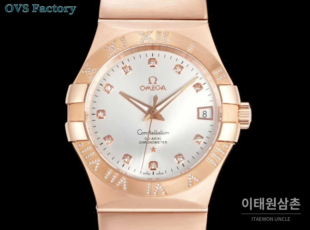 오메가 컨스텔레이션 스틸 골드톤 다이아몬드 로만베젤 데이트 오토매틱 38mm 골드 / 실버 로즈골드 브레이슬릿