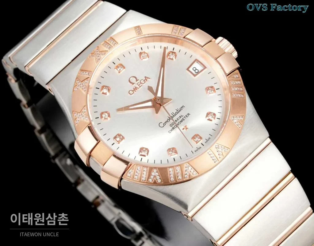 오메가 컨스텔레이션 스틸 골드톤 다이아몬드 로만베젤 데이트 오토매틱 38mm 골드 / 실버 투톤 브레이슬릿