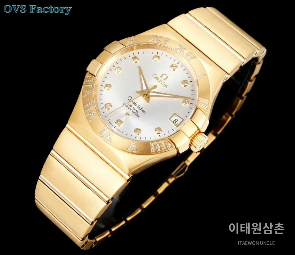 오메가 컨스텔레이션 스틸 골드톤 다이아몬드 로만베젤 데이트 오토매틱 38mm 골드 / 실버 골드 브레이슬릿