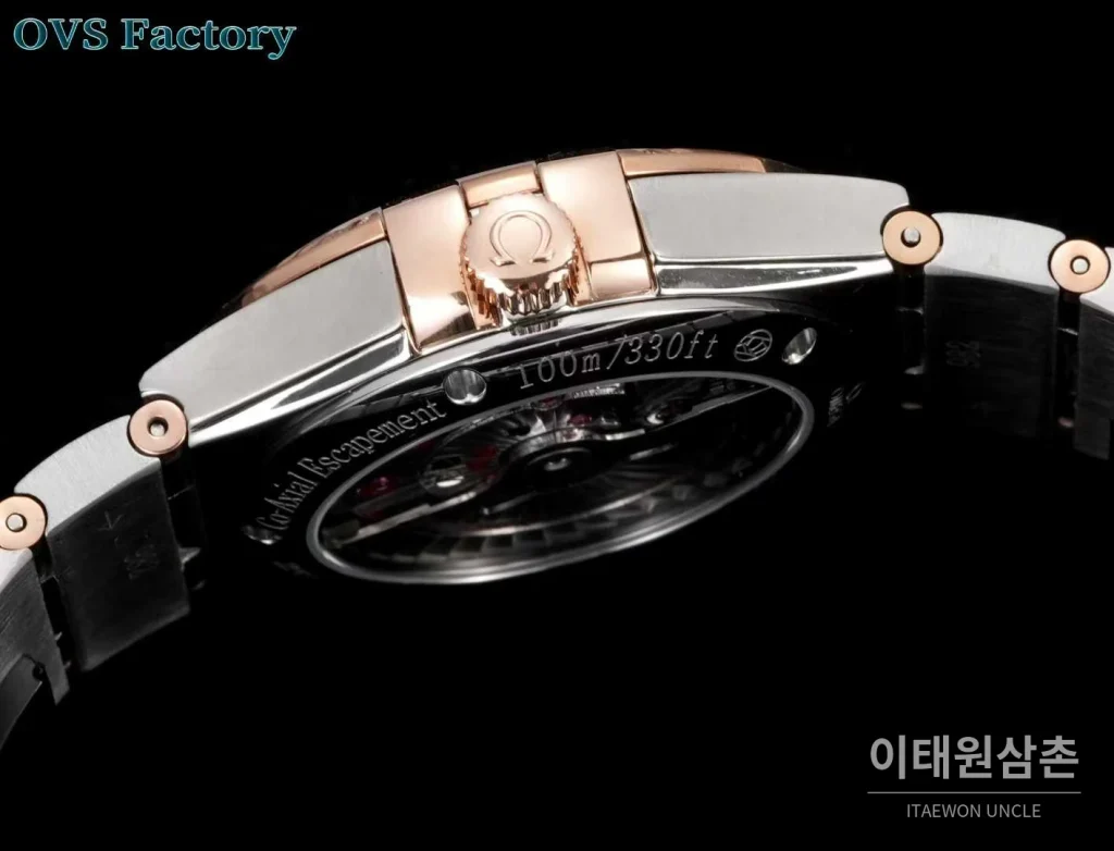 오메가 컨스텔레이션 스틸 골드톤 다이아몬드 로만베젤 데이트 오토매틱 38mm 골드 / 실버 투톤 브레이슬릿