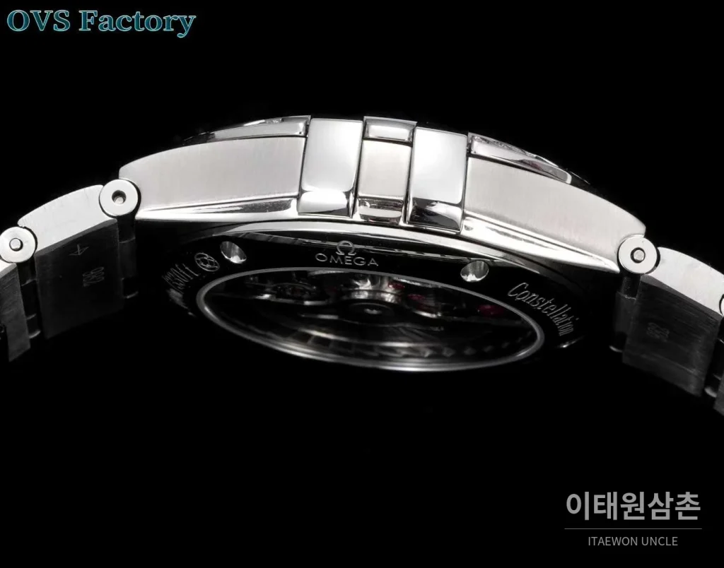 오메가 컨스텔레이션 스틸 골드톤 다이아몬드 로만베젤 데이트 오토매틱 38mm 골드 / 실버 스틸 브레이슬릿