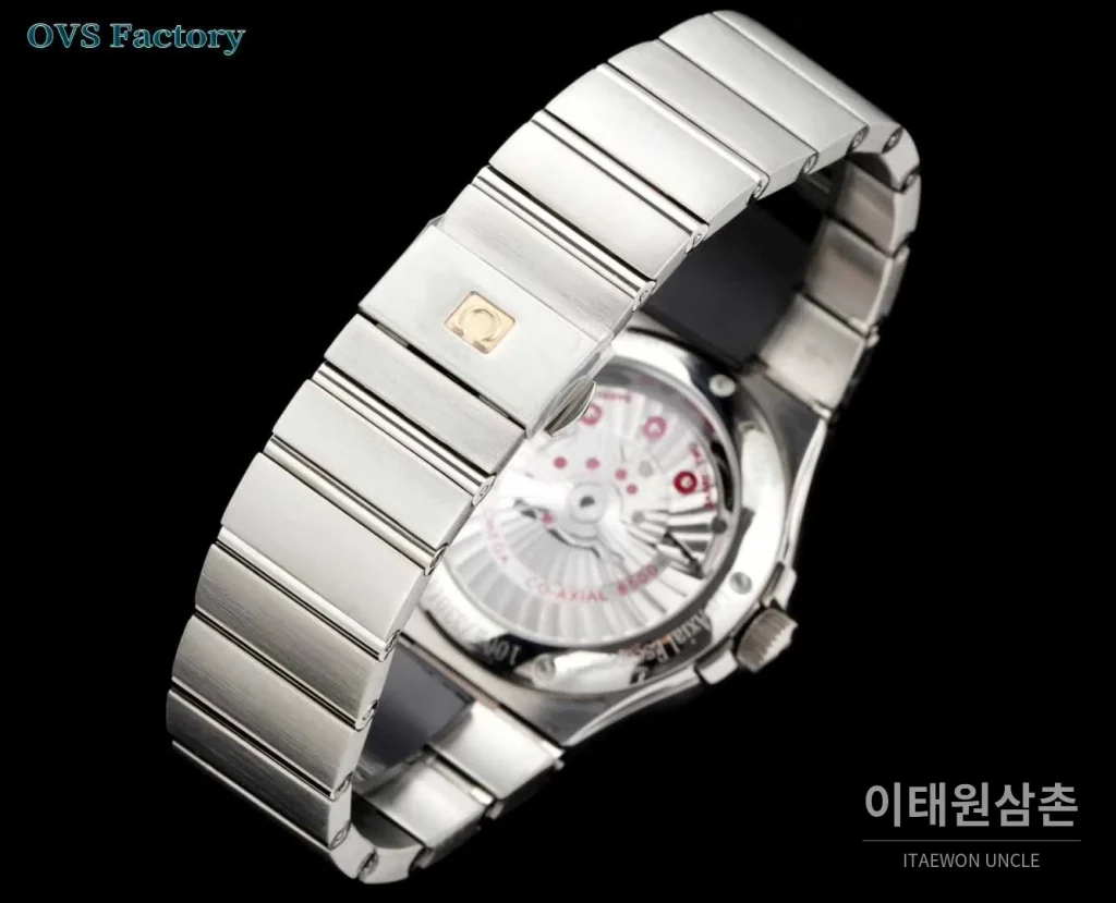 오메가 컨스텔레이션 스틸 골드톤 다이아몬드 로만베젤 데이트 오토매틱 38mm 골드 / 실버 스틸 브레이슬릿