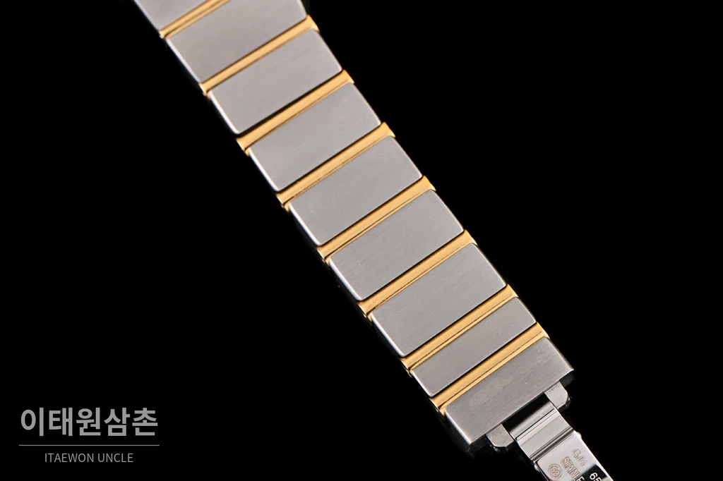 오메가 컨스텔레이션 4세대 옐로우골드 투톤 다이아 세팅 베젤 화이트 웨이브 다이얼 쿼츠 시계 27mm