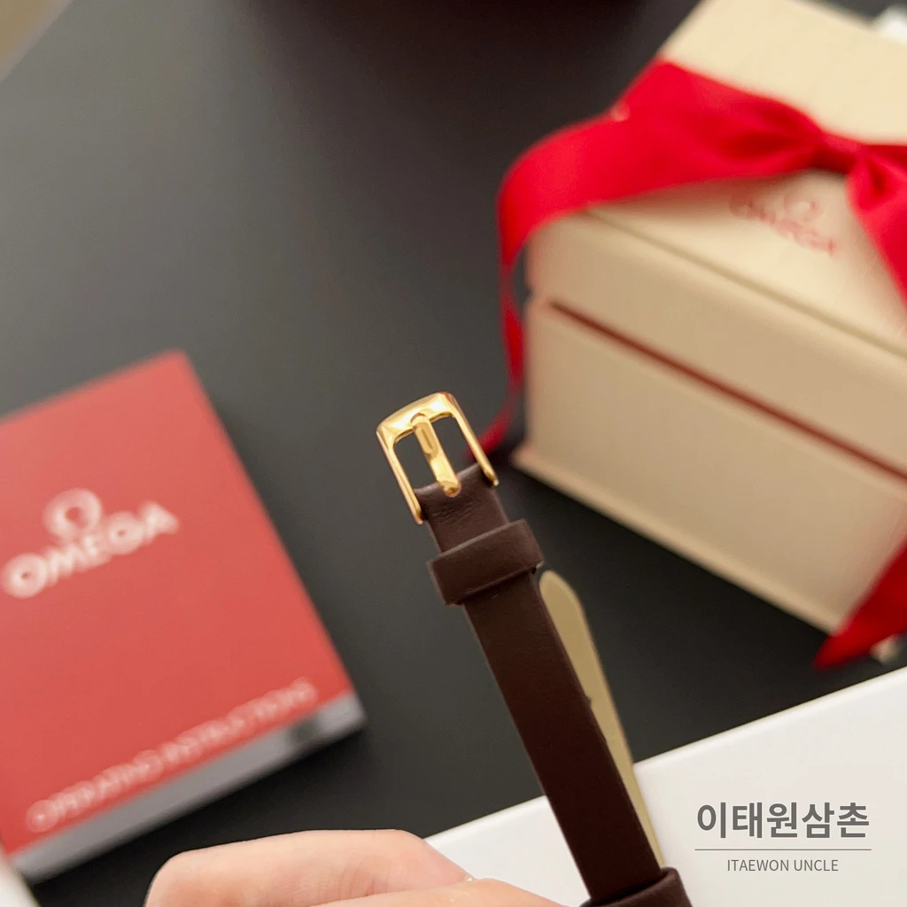 오메가 드빌 칼레이도스코프 다이아몬드컷 미니 여성시계 18.5mm 화이트 다이얼 브라운 가죽 스트랩 골드 베젤