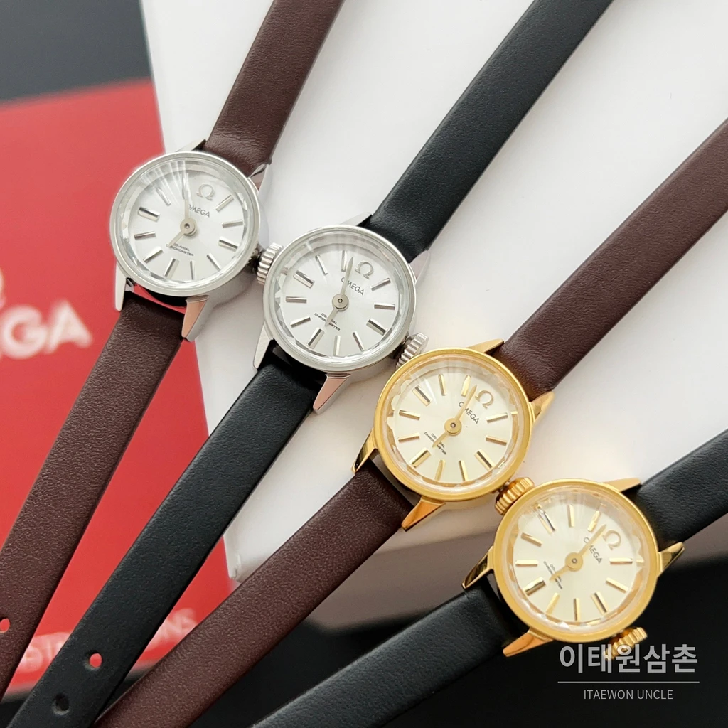 오메가 드빌 칼레이도스코프 다이아몬드컷 미니 여성시계 18.5mm 화이트 다이얼 블랙 가죽 스트랩 골드 베젤