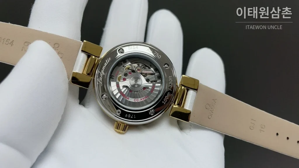 오메가 드빌 레이디매틱 실버베젤 자개다이얼 오토매틱 34mm