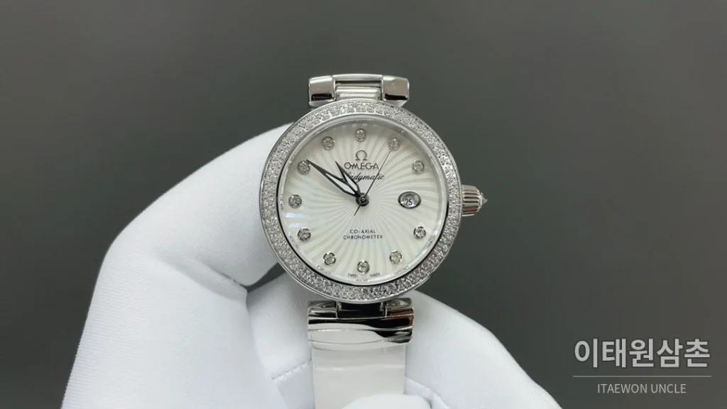 오메가 드빌 레이디매틱 실버베젤 네이비마더오브펄 오토매틱 34mm