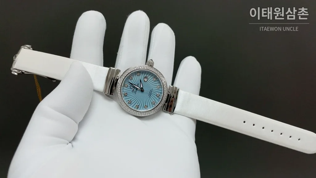 오메가 드빌 레이디매틱 실버베젤 화이트마더오브펄 오토매틱 34mm