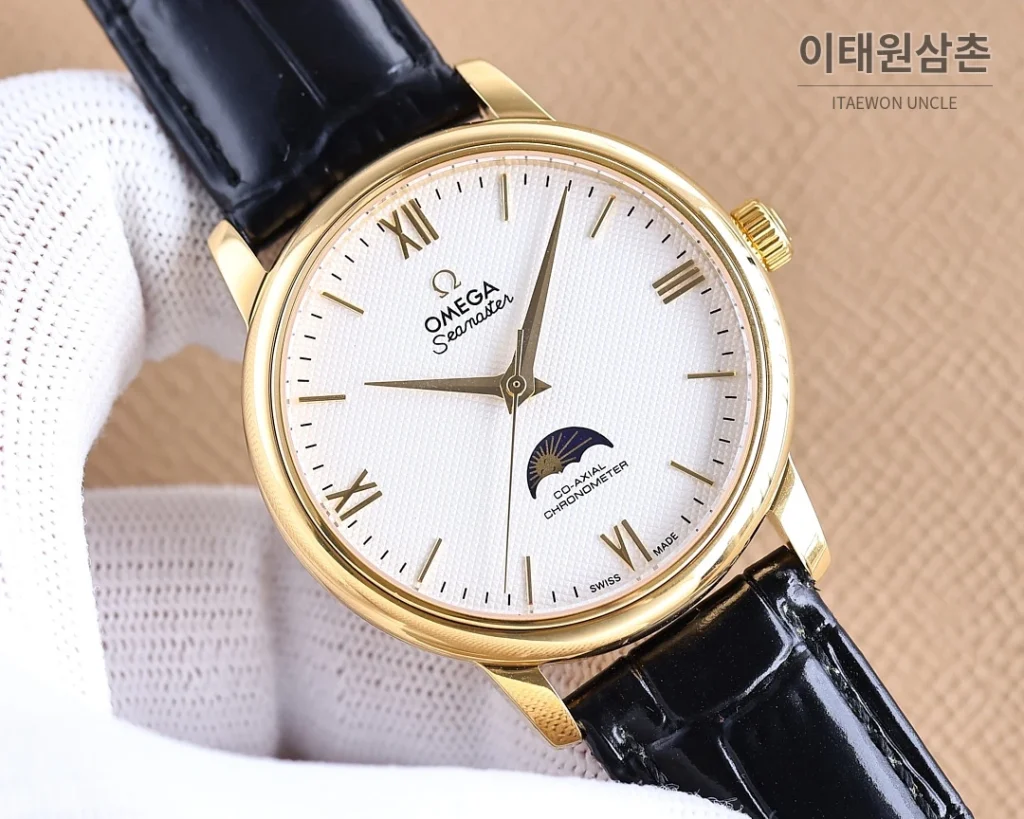 오메가 명디안 월페이즈 오토매틱 40mm 화이트 다이얼