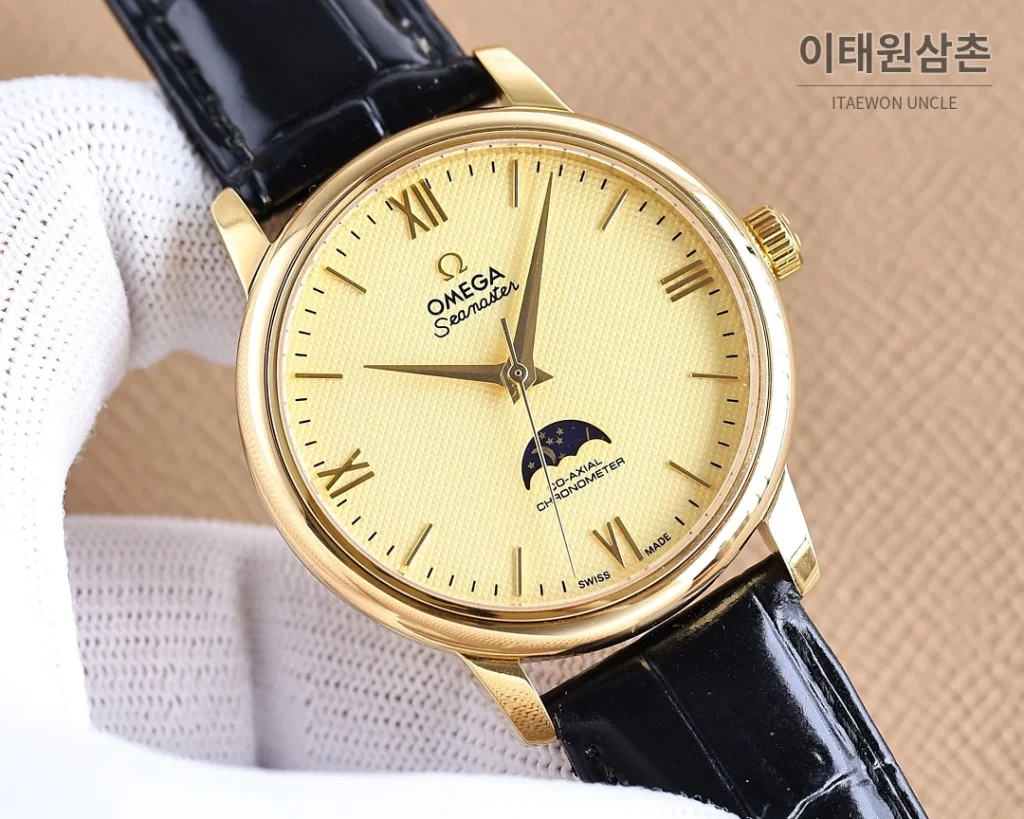 오메가 명디안 월페이즈 오토매틱 40mm 화이트 다이얼
