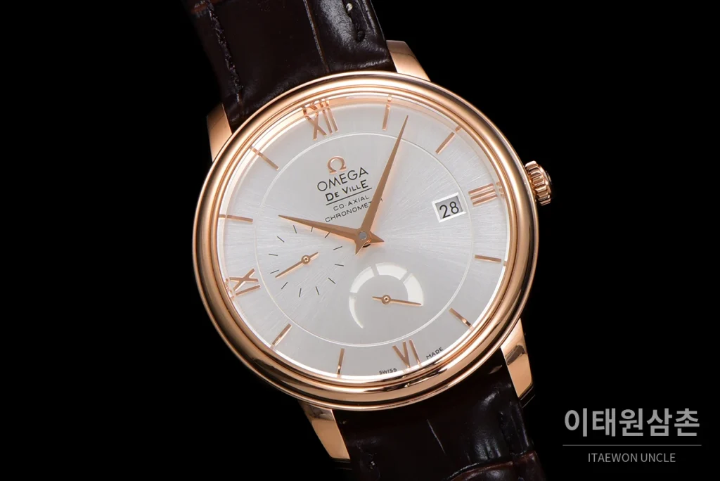 오메가 드빌 파워리저브 데이트 스몰세컨즈 오토매틱 39.5mm 실버 브라운 가죽 스트랩 로즈골드 베젤